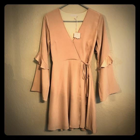 Lush Dresses & Skirts - Lush wrap around dress with ruffle sleeves